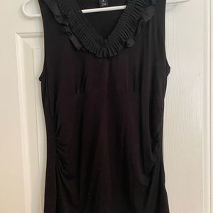 Lovely Black top, stretch material (rayon and spandex). M